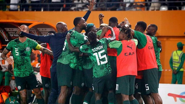 Super Eagles stars celebrate after an important playoff victory.